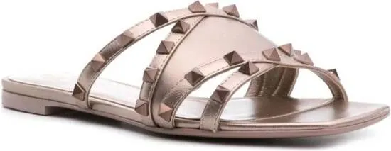 Valentino Garavani Rockstud metallic leather slides Gold